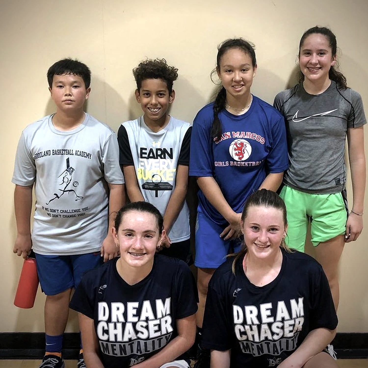 Dream Chaser athletes in Dream Chaser Mentality shirts